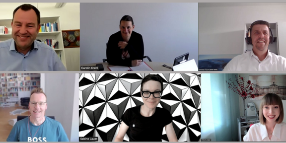 Screenshot showing participants' video tiles in a Zoom call